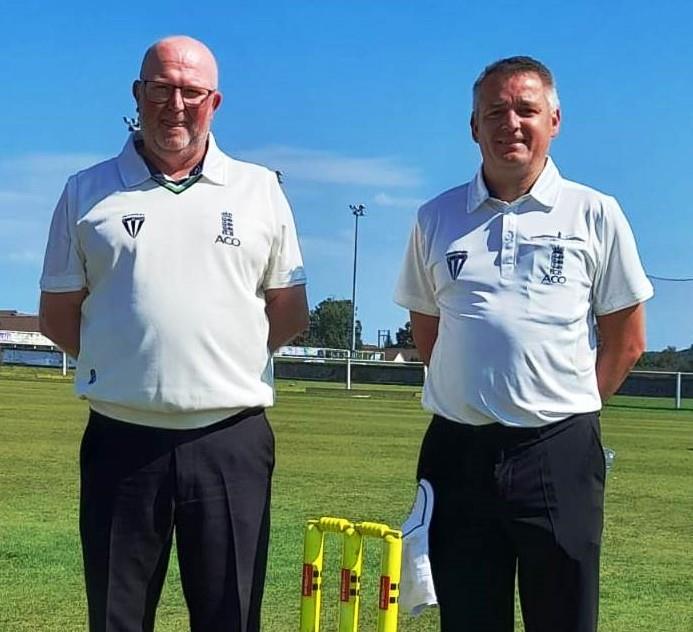 Umpires Ian Milsom and Neill Crawshaw in the summer